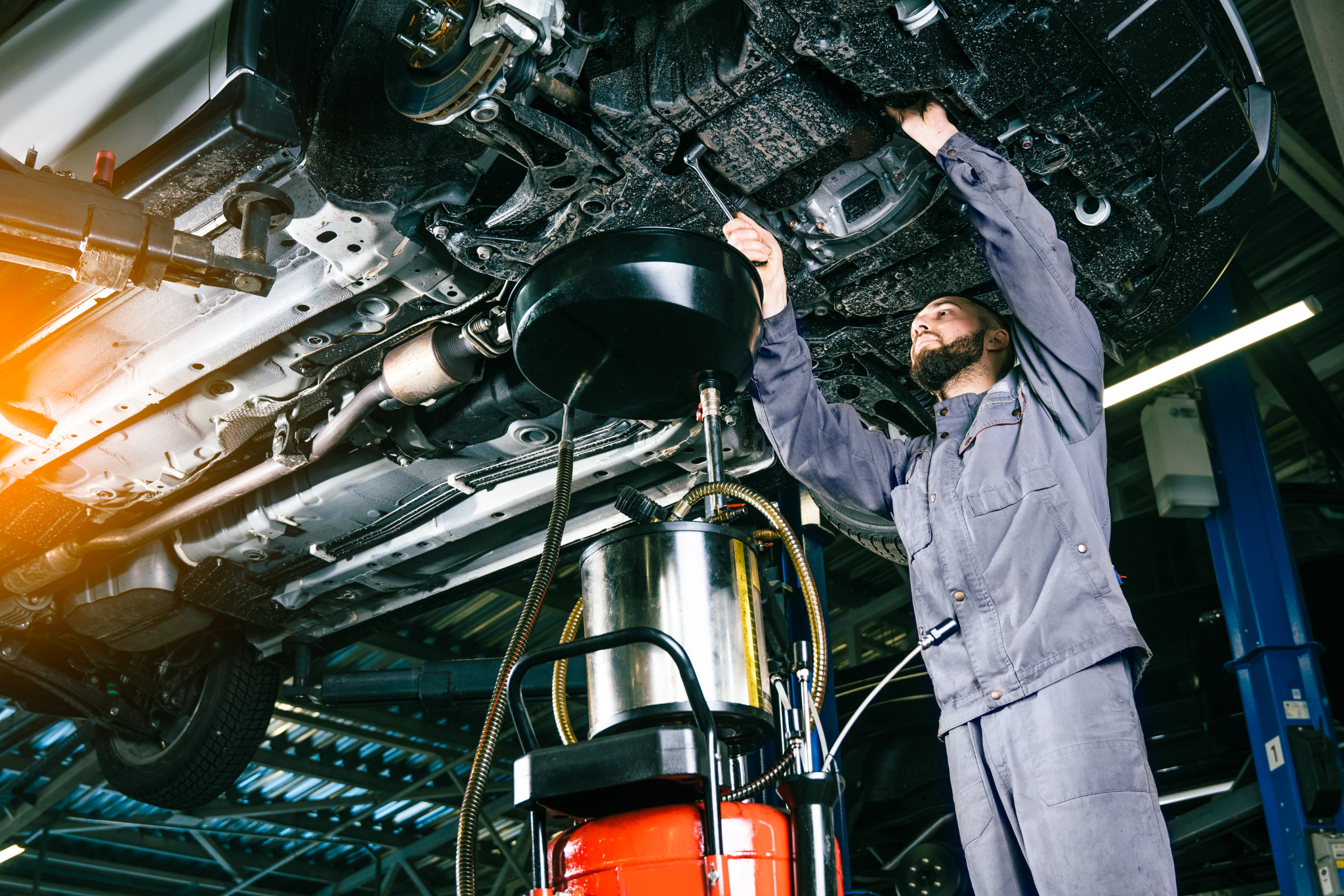 Destin Autos mechanic inspecting a used vehicle before sale