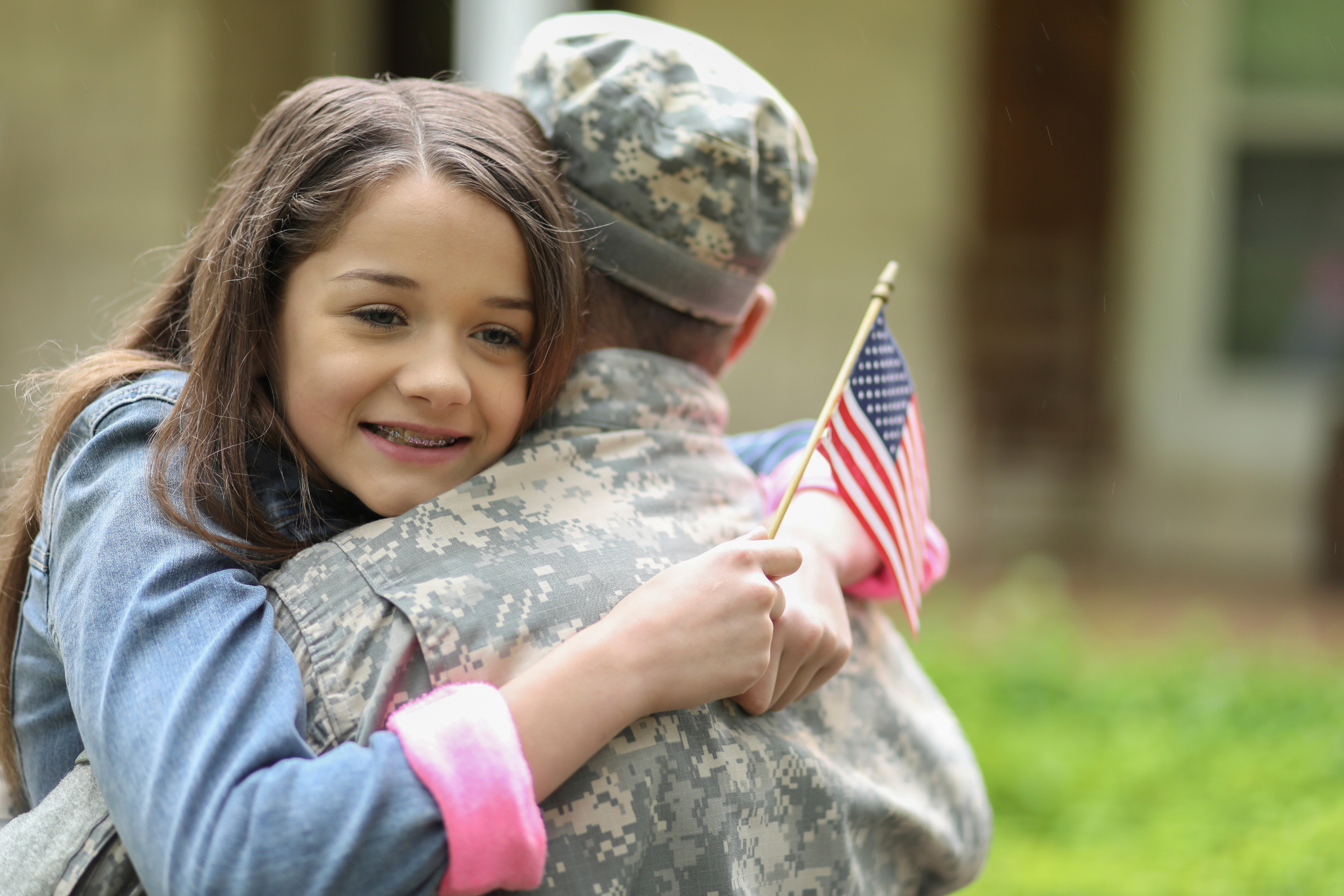 Military service member reuniting with family