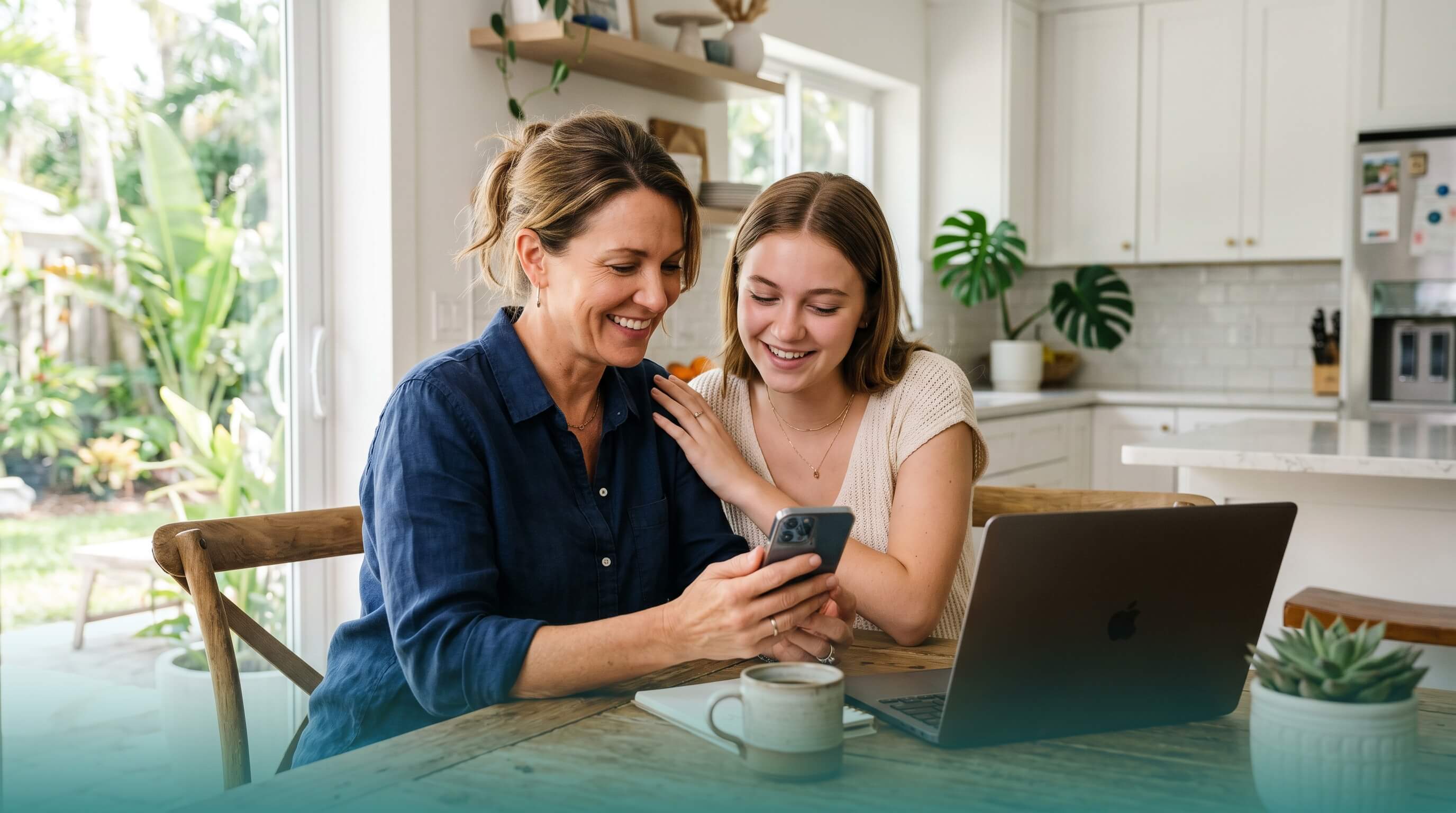 Mother helping her college-age daughter apply for used car financing in Florida
